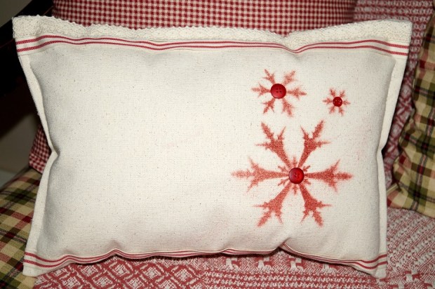 stenciled snowflake pillow from a placemat