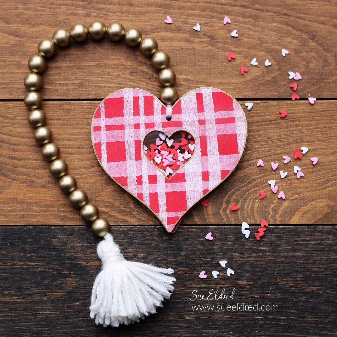 How to make Plaid Shaker hearts using Dollar Tree Heart Ornaments.