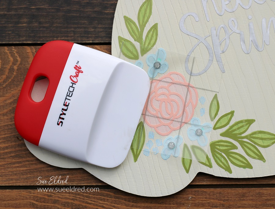 How to make a Spring Bunny Door Hanger with a Dollar Tree Bunny, Acrylic Paint, and StyleTechCraft Glossy Craft Vinyl.
