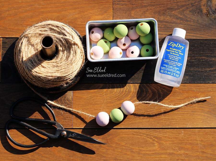 How to make a Spring Bunny Door Hanger with a Dollar Tree Bunny, Acrylic Paint, and StyleTechCraft Glossy Craft Vinyl.