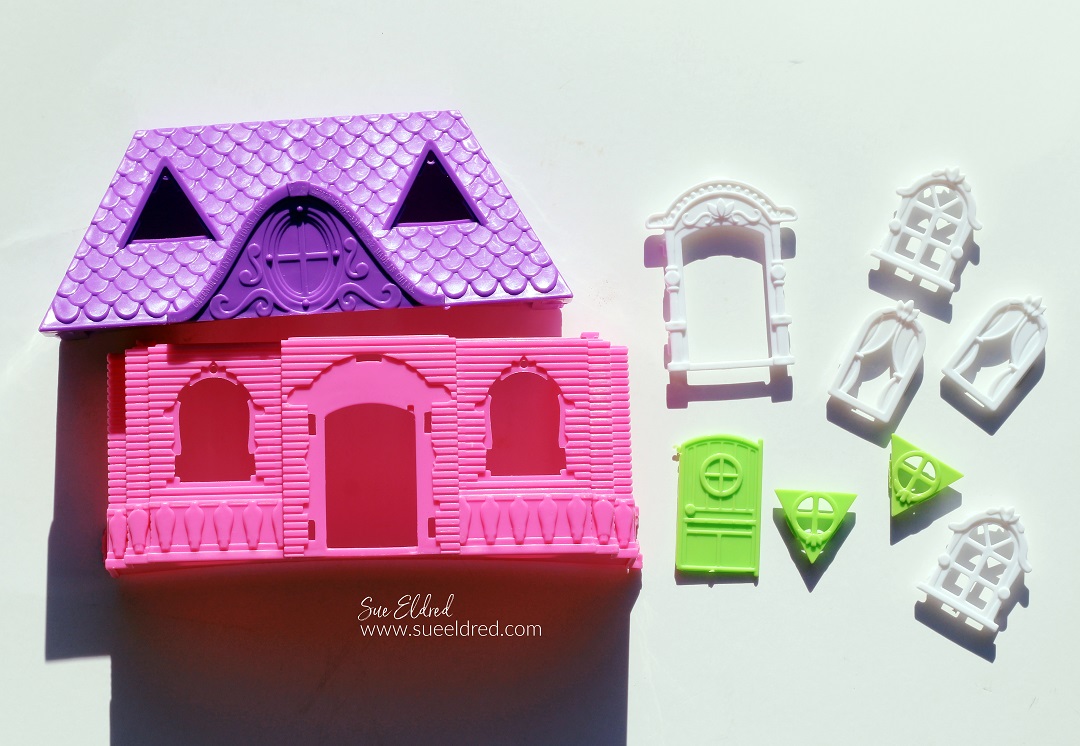 How to make a Dollar Tree Dollhouse into a Miniature Christmas House.